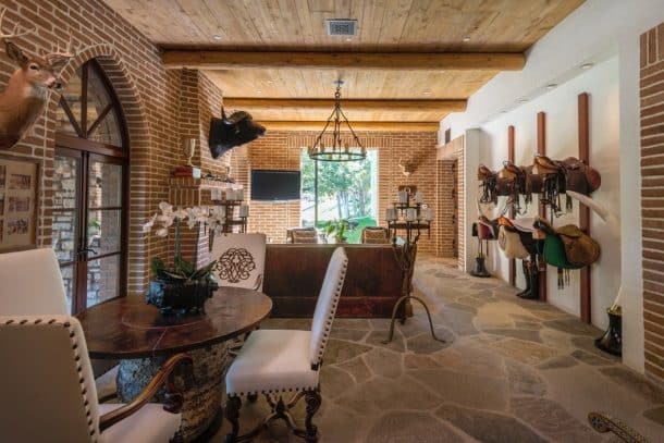 (PICTURED:2727 Benedict Canyon living space) - A luxury mansion whose previous owners include Cher and Eddie Murphy is on sale for an unBELIEVEable 5M (58.7M). The celeb estate, sprawled across 16 acres in Benedict Canyon, Los Angeles, USA, hit the market today (FRI JUNE 10 2016). Singer Cher owned the pad in the 80s before selling it to comedian Eddie Murphy for just .4M (.4M) who lived there until 1995. The 20,000 square foot main house comes with a tennis court, swimming pool and equestrian facilities., Image: 289640370, License: Rights-managed, Restrictions: , Model Release: no, Credit line: Profimedia, Caters News